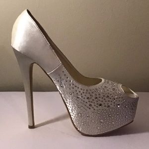 White peep toe, sparkling platform.